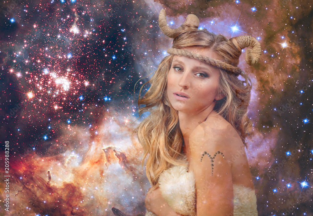 Astrology. Aries Zodiac Sign. Woman on night sky background Astrology. Aries Zodiac Sign. Woman on night sky background