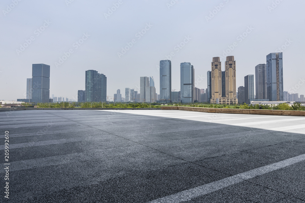 Empty Road with modern business office building Empty Road with modern business office building