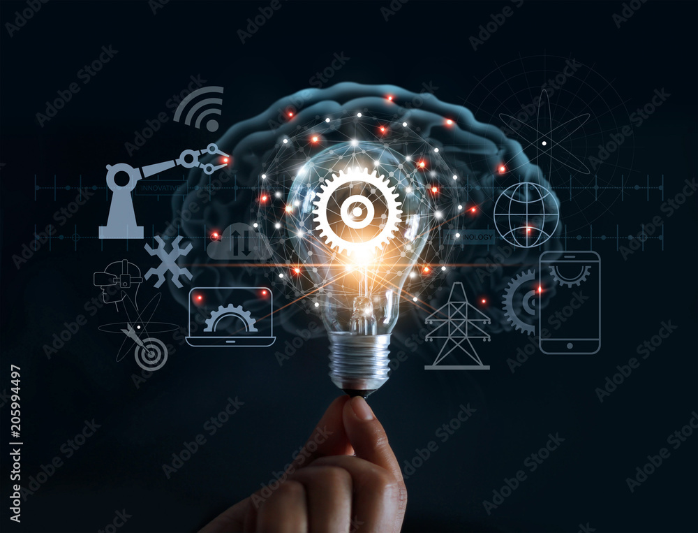 Hand holding light bulb and cog inside and innovation icon network  connection on brain background, innovative technology in science and  industrial concept Stock Photo | Adobe Stock