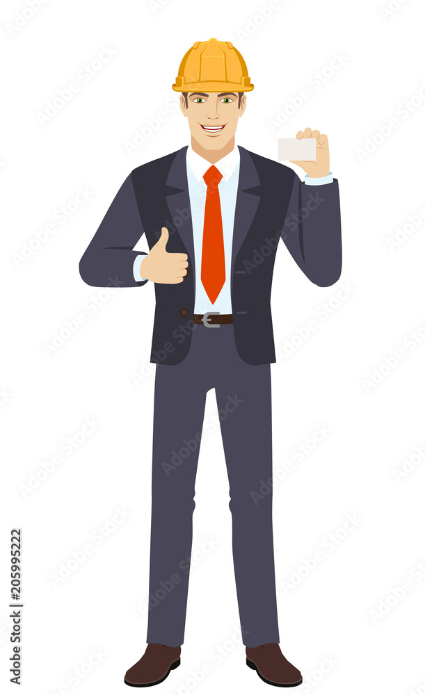 Businessman in construction helmet showing thumb up and showing the business card Businessman in construction helmet showing thumb up and showing the business card