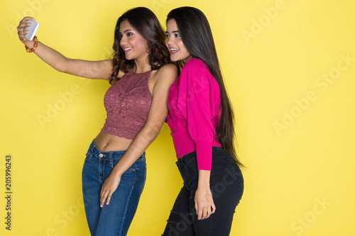 Two Hispanic Teen Sisters