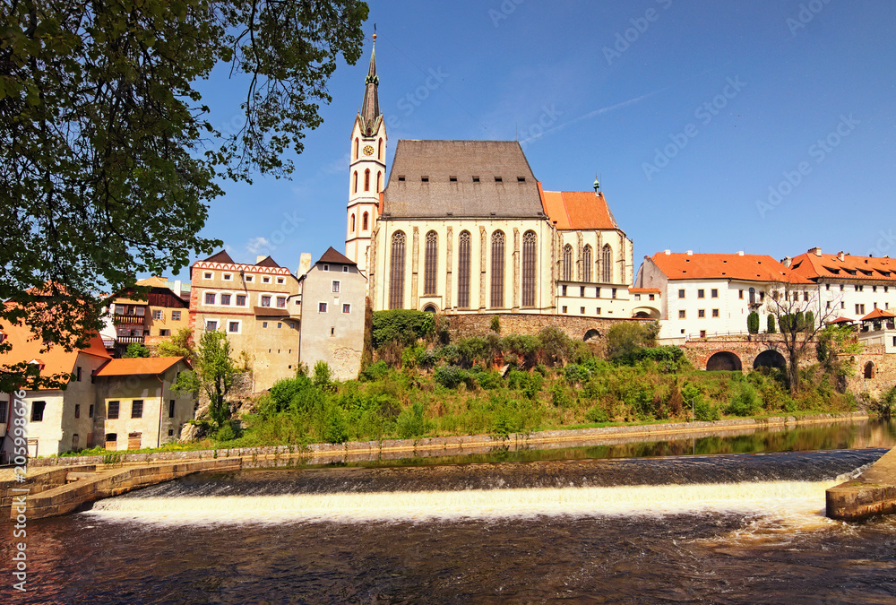 View of St. Vitus Cathedral in Cesky Krumlov and Vltava River at spring. The historical center of the city in 1992 is listed as a UNESCO World Heritage Site. Czech Republic