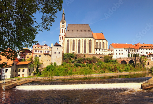 View of St. Vitus Cathedral in Cesky Krumlov and Vltava River at spring. The historical center of the city in 1992 is listed as a UNESCO World Heritage Site. Czech Republic