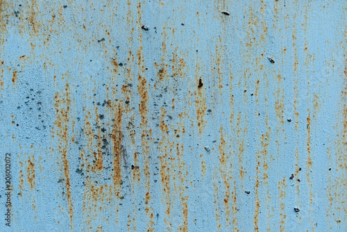 old scratched blue background with rust texture © LIGHTFIELD STUDIOS