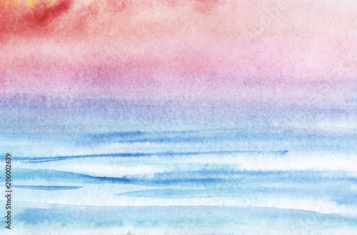 A hand painted watercolor background. Abstract imitation of sunset sky and sea surface. Bright gradient from red to blue on a textured paper. photo