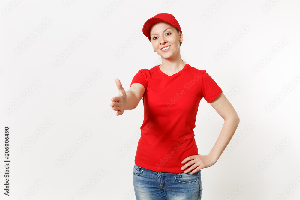Delivery woman in red uniform isolated on white background. Friendly female in cap, t-shirt, jeans working as courier looking camera standing with outstretched hand for greeting. Copy space flack. Delivery woman in red uniform isolated on white background. Friendly female in cap, t-shirt, jeans working as courier looking camera standing with outstretched hand for greeting. Copy space flack.