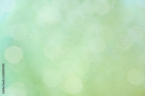 green color abstract background with blurred defocus bokeh light for template