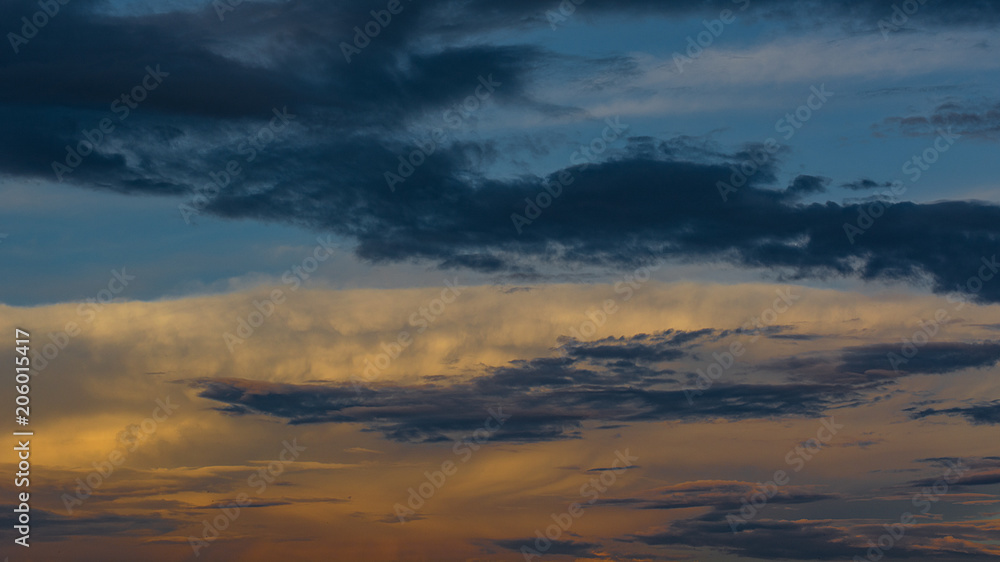 Beautiful sunset sky with clouds, background