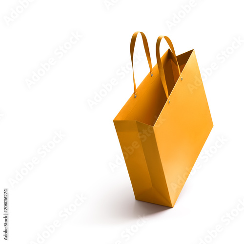 Gold shopping bag isolated on white background