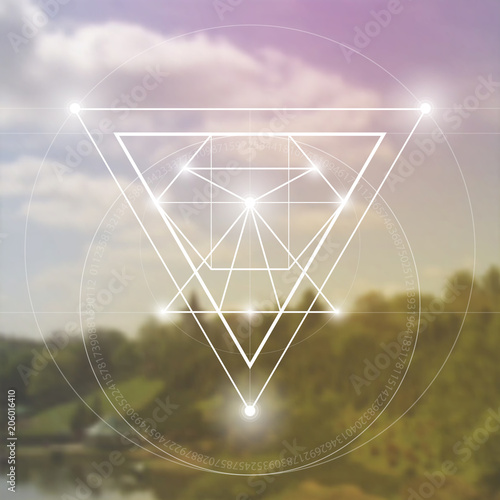 Interlocking circles and triangles hipster sacred geometry illustration with golden ratio digits in front of photographic background.