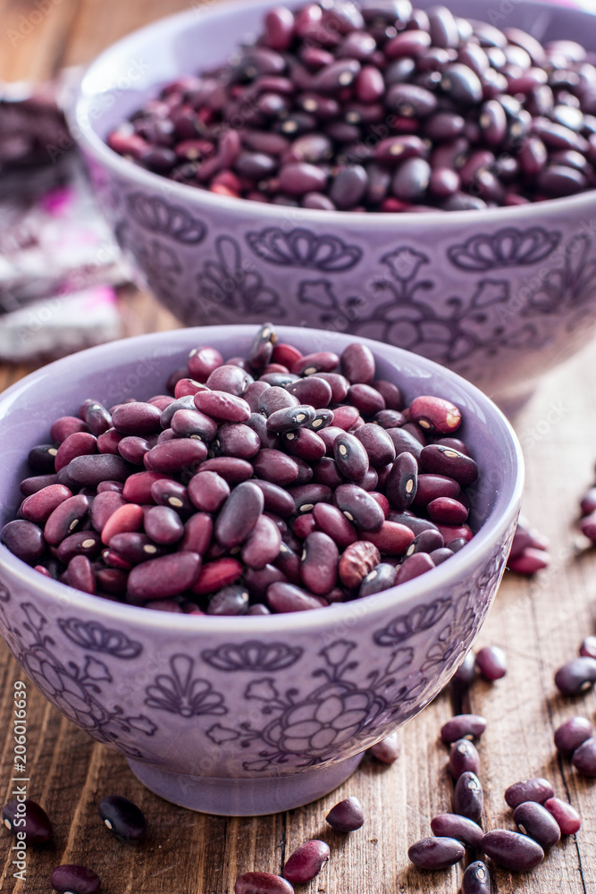 red beans dry in two bowls, selective focus red beans dry in two bowls, selective focus