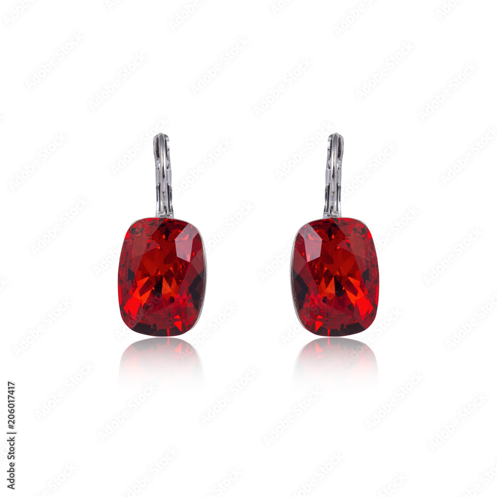 Pair of ruby diamond earrings isolated on white Pair of ruby diamond earrings isolated on white