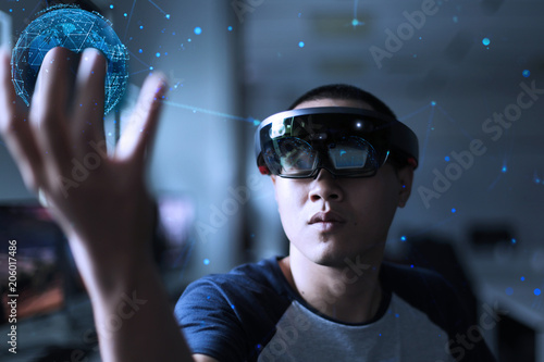 Men playing virtual reality with Microsoft hololens | Enter magic world with VR gear photo