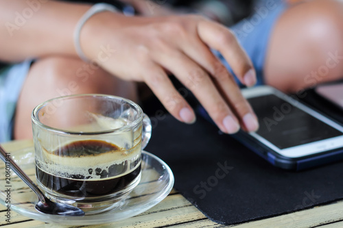 Man sitting drinking coffee.