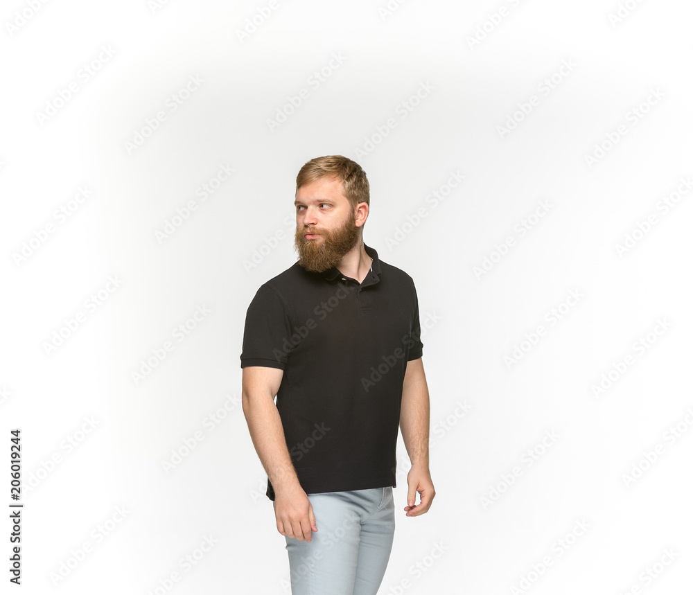 Closeup of young man's body in empty black t-shirt isolated on white background. Mock up for disign concept Closeup of young man's body in empty black t-shirt isolated on white background. Mock up for disign concept