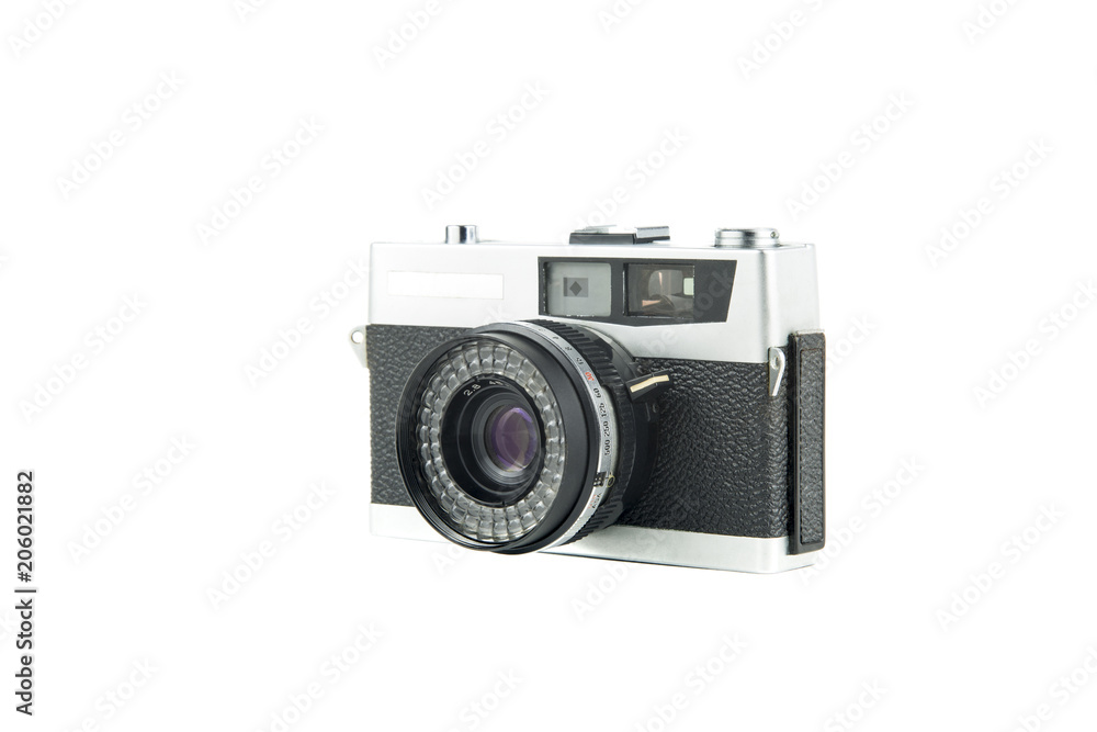 vintage film camera isolated in white background / portrait of an old camera in silver colored metal