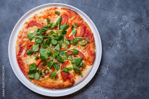 Vegetarian pizza on grey background, copy space
