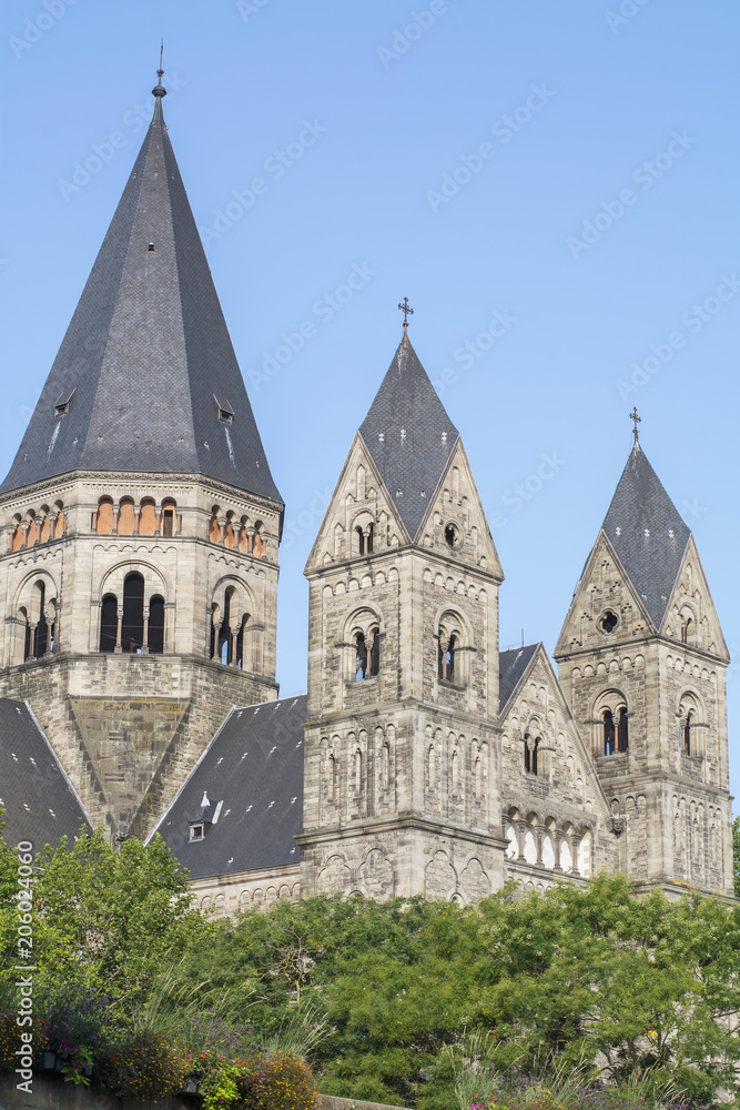 Old grey french castle with classic windows and roofs close-up in Metz in France