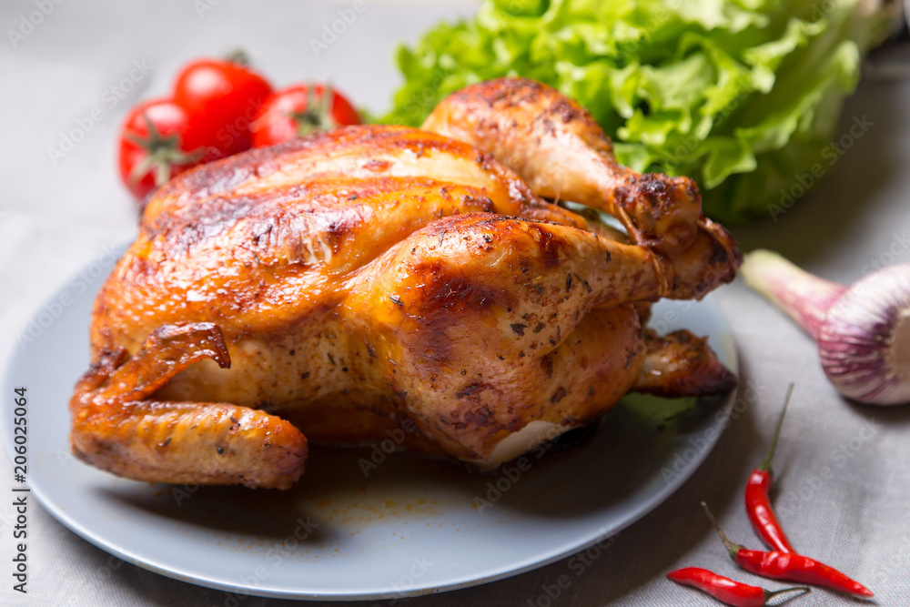 Chicken baked whole. Selective focus, close-up. Chicken baked whole. Selective focus, close-up.