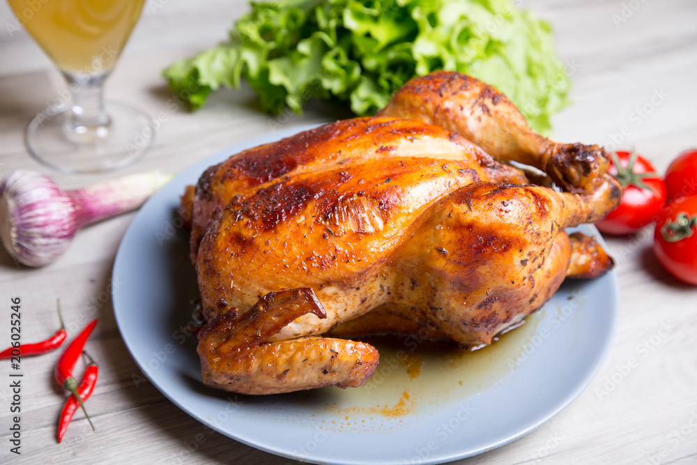 Chicken baked whole. Selective focus, close-up. Chicken baked whole. Selective focus, close-up.