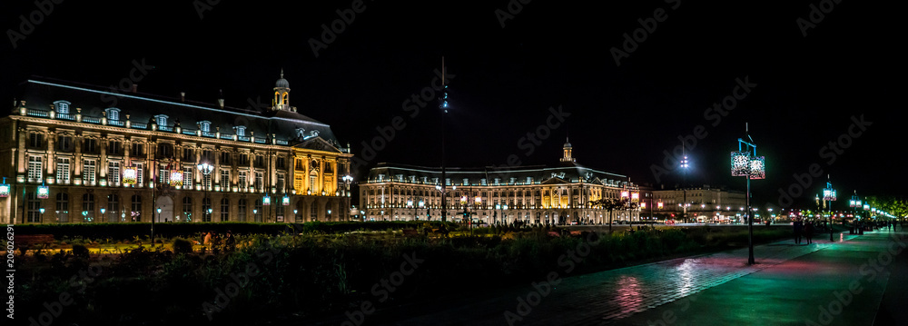 Bordeaux, France, 10 may 2018 - Place de la Bourse at night seen from a distance from the boulevard