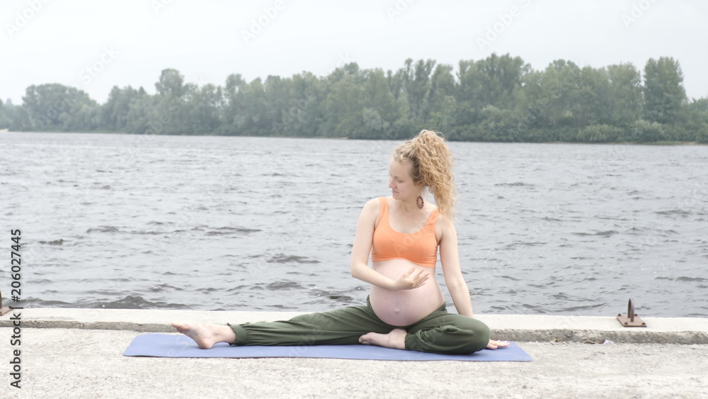 girl doing yoga in park on summer day