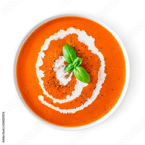 Obraz na plátně Tomato soup in a white bowl isolated on white background