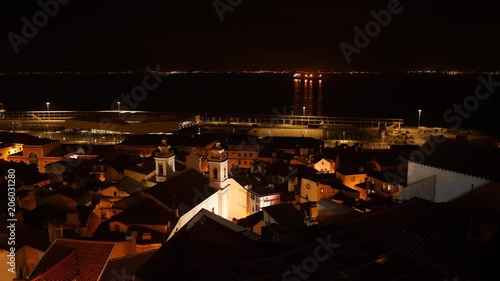 Night panorama of Lisbon and Taag river. photo