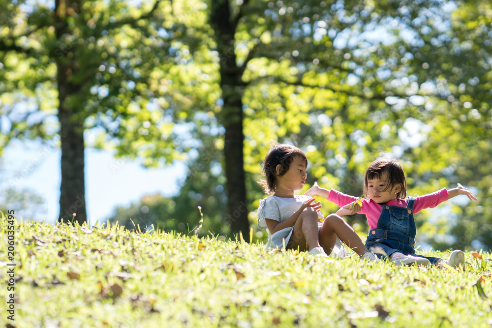 Fototapeta premium two little toddler having fun