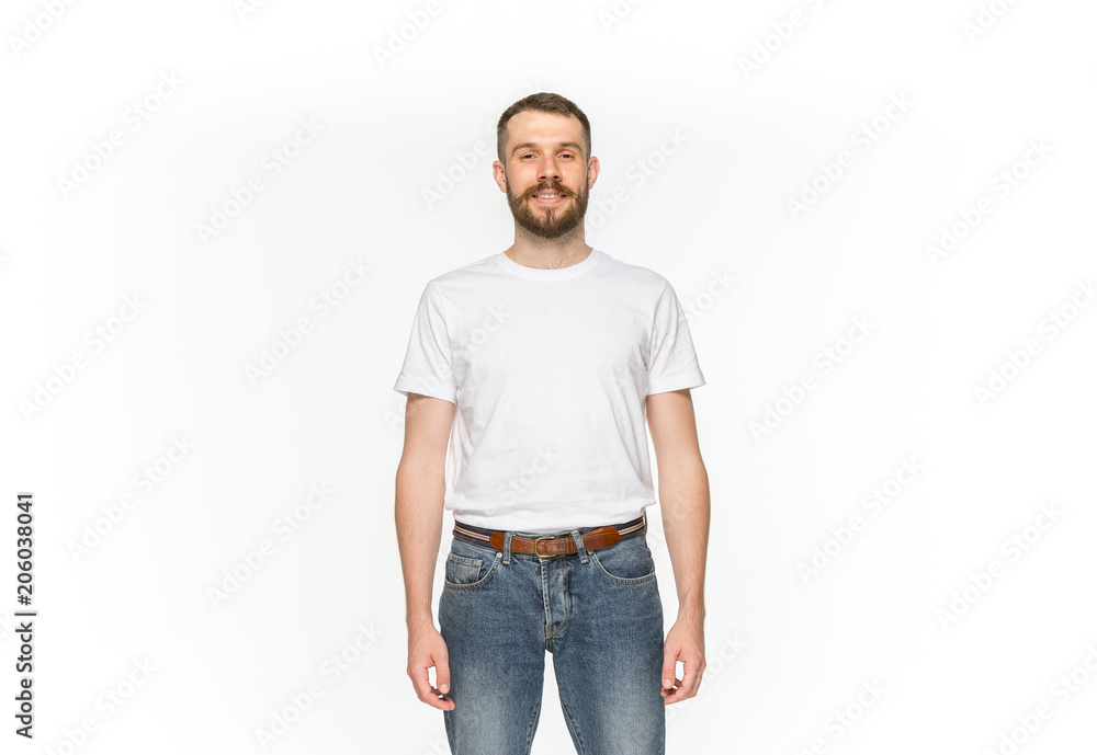 Closeup of young man's body in empty white t-shirt isolated on white background. Mock up for disign concept Closeup of young man's body in empty white t-shirt isolated on white background. Mock up for disign concept