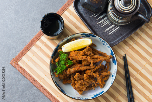 Ika Geso japanese fried spicy squid tentacle flat lay photo
