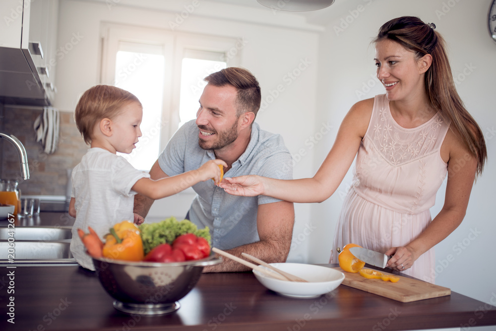 Family preparing meal with son Family preparing meal with son