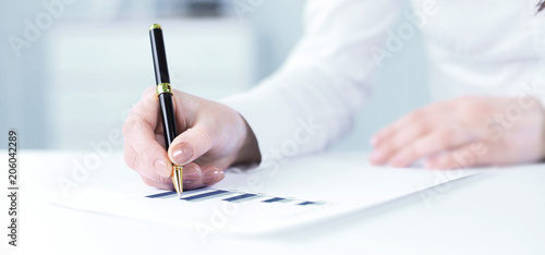 business woman analyzing the financial schedule