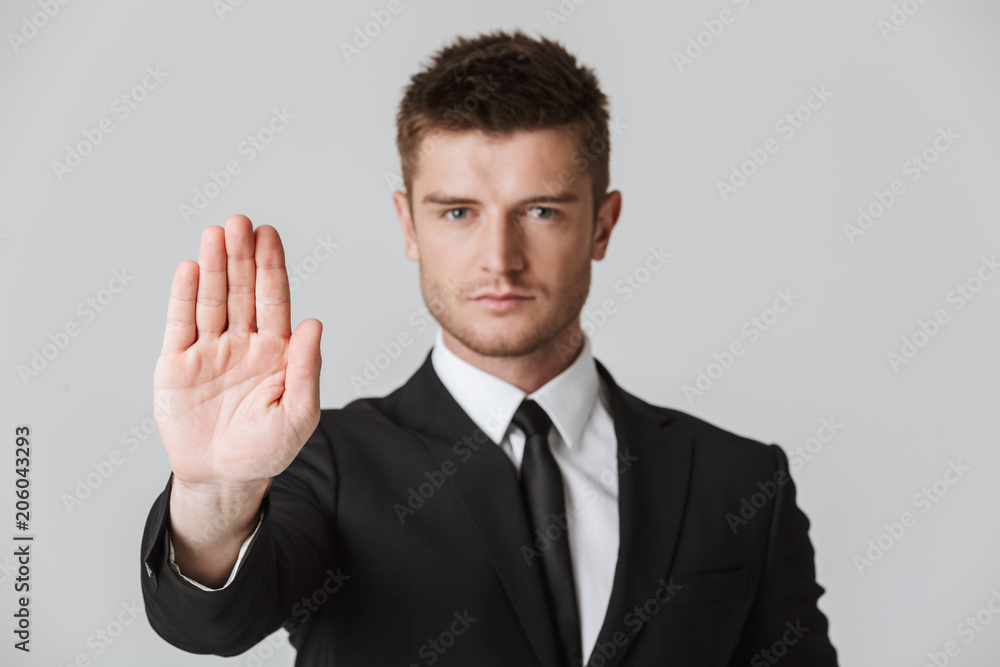 Portrait of a confident young businessman in suit Portrait of a confident young businessman in suit