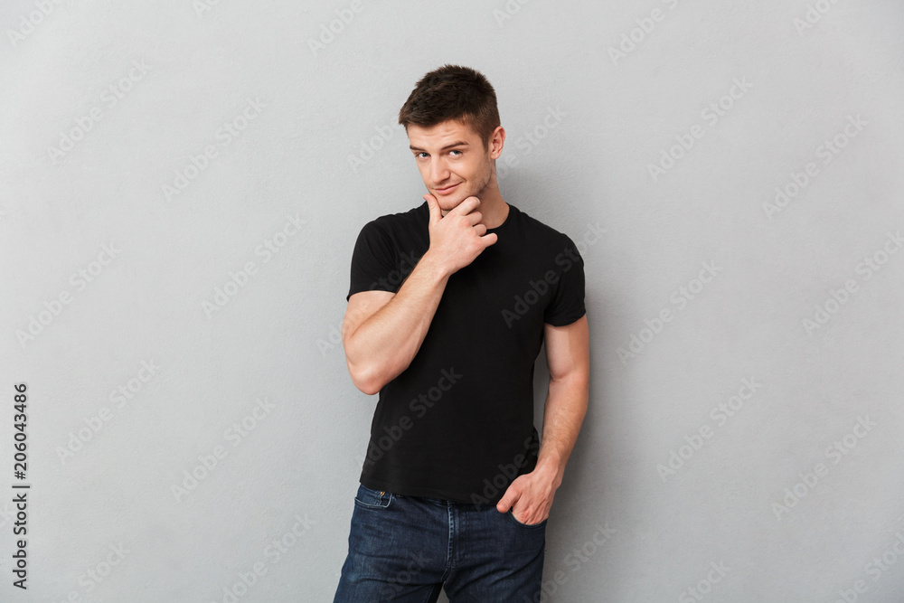 Portrait of a charming young man looking at camera Portrait of a charming young man looking at camera