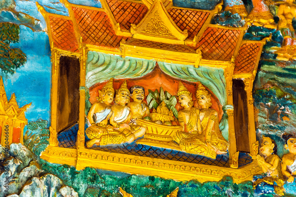 The bas-relief on the wall of the temple in Luang Prabang, Laos. Close-up.