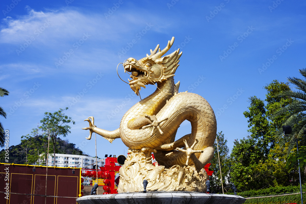 Fototapeta premium Old street fountain with golden sea Dragon, Phuket, Thailand