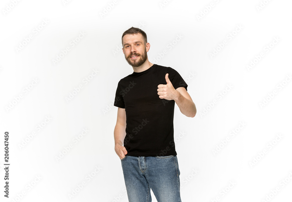 Closeup of young man's body in empty black t-shirt isolated on white background. Mock up for disign concept Closeup of young man's body in empty black t-shirt isolated on white background. Mock up for disign concept