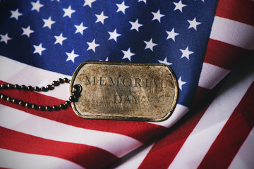 american flag and text memorial day in a dog tag
