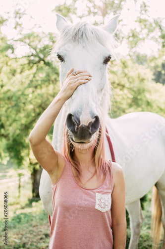 Woman with horse head. Funny horse image. 
