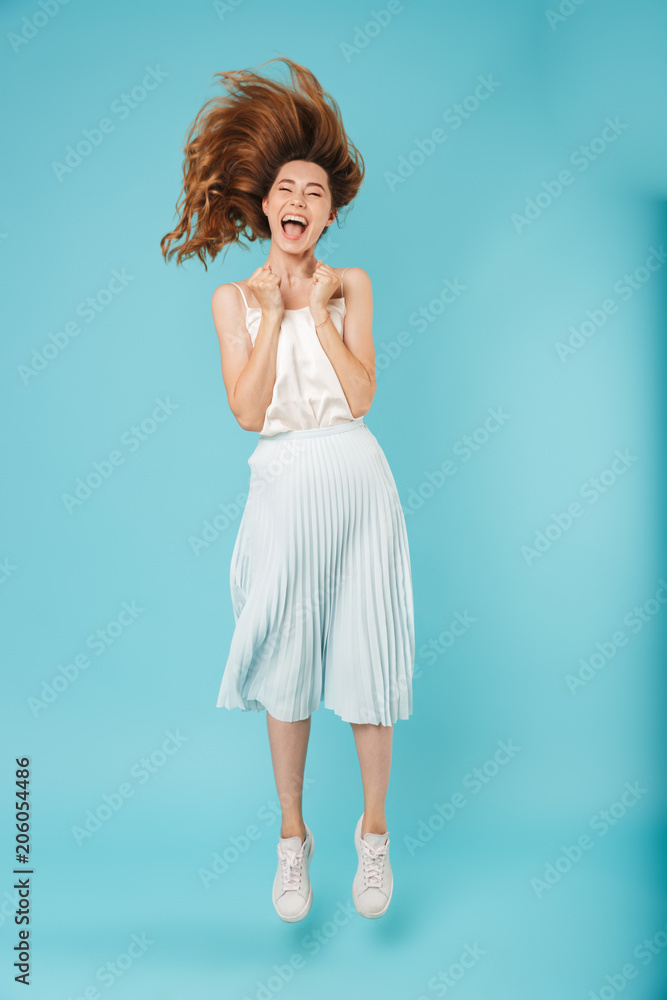 Naklejka premium Shocked caucasian woman shaking hair.