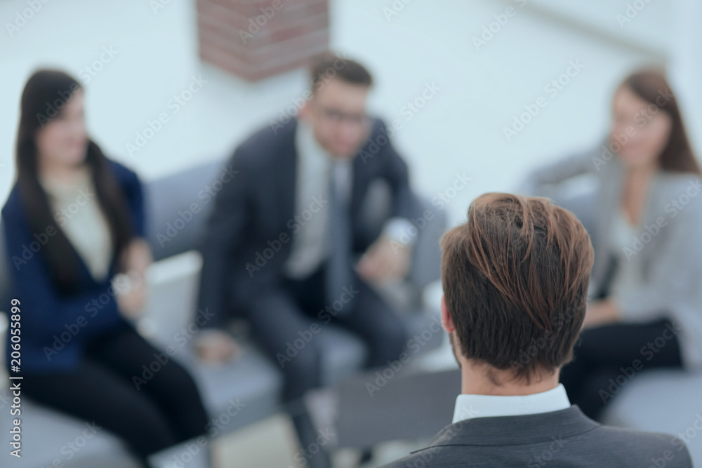 Business and office concept - business team having meeting in of Business and office concept - business team having meeting in of