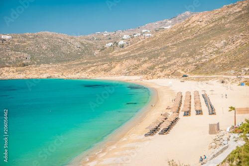 Fototapeta Naklejka Na Ścianę i Meble -  Beach with chars and umbrella of Mykonos Greece