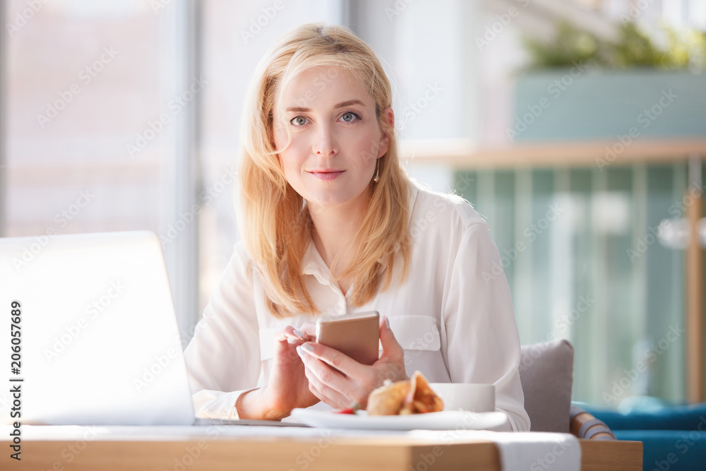 Successful business people with gadgets Successful business people with gadgets