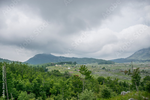 A walk in the woods and mountains in cloudy weather.