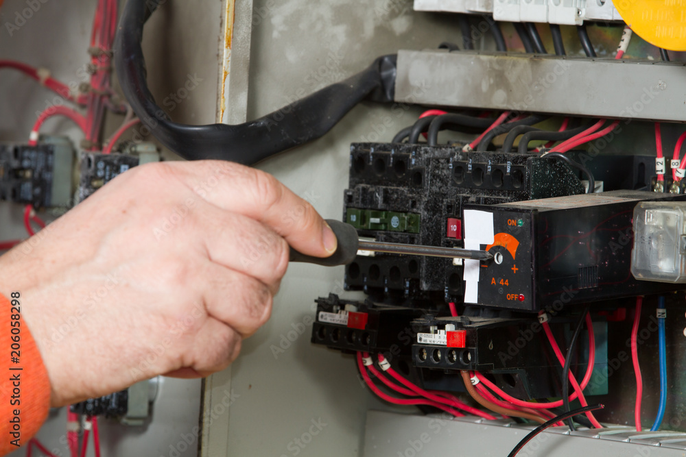 electrician fixing electrical system with different tools electrician fixing electrical system with different tools