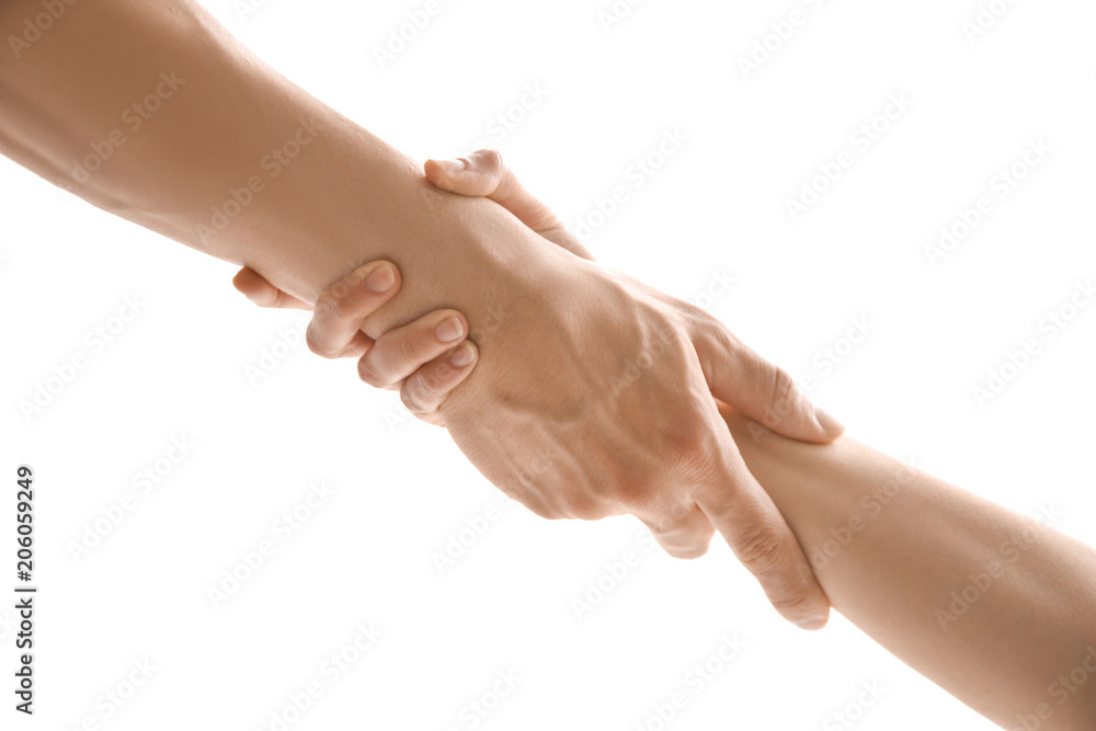 Man and woman holding hands together on light background. Unity concept Man and woman holding hands together on light background. Unity concept