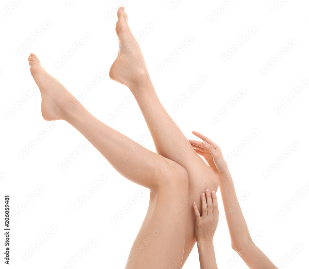Young woman showing smooth silky skin after epilation on white background Young woman showing smooth silky skin after epilation on white background