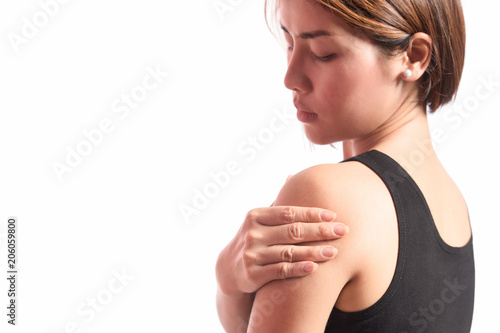 shoulder pain in young woman, young asian woman holding hand on shoulder with pain, double exposture of shoulder and humerus bone photo