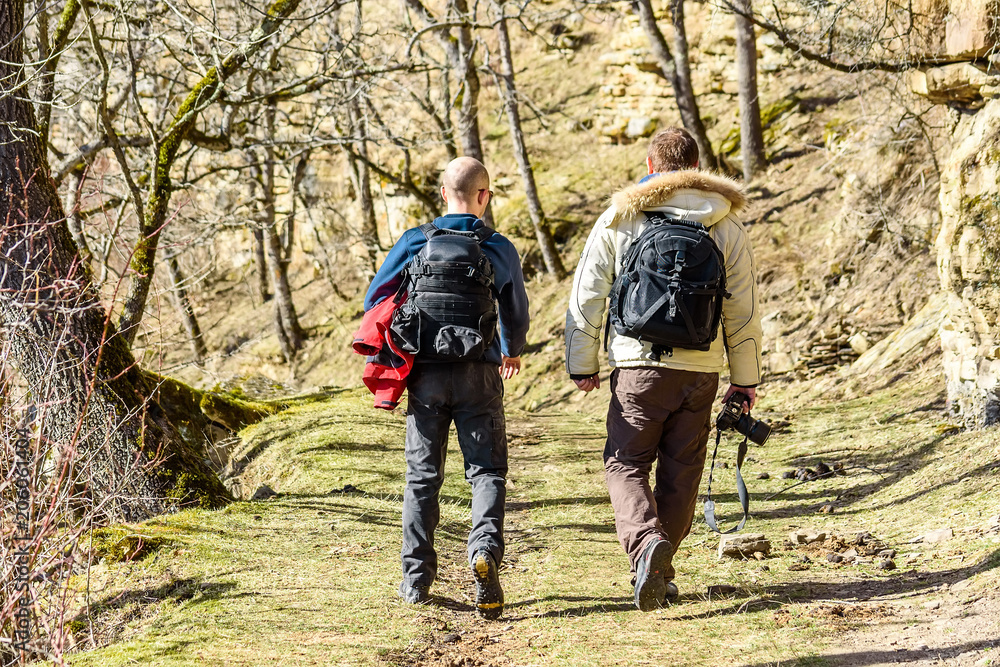 Two outdoor photographers in autumn forest Two outdoor photographers in autumn forest